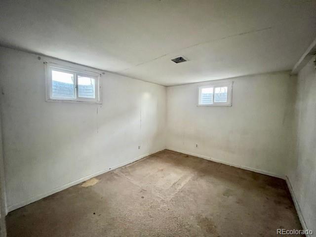 8950 Ithaca Way Westminster, CO 80031 - Photo 10 of 13 an empty room with a window