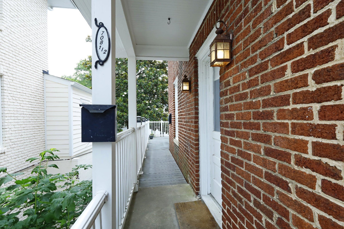 a view of a pathway with a potted plant