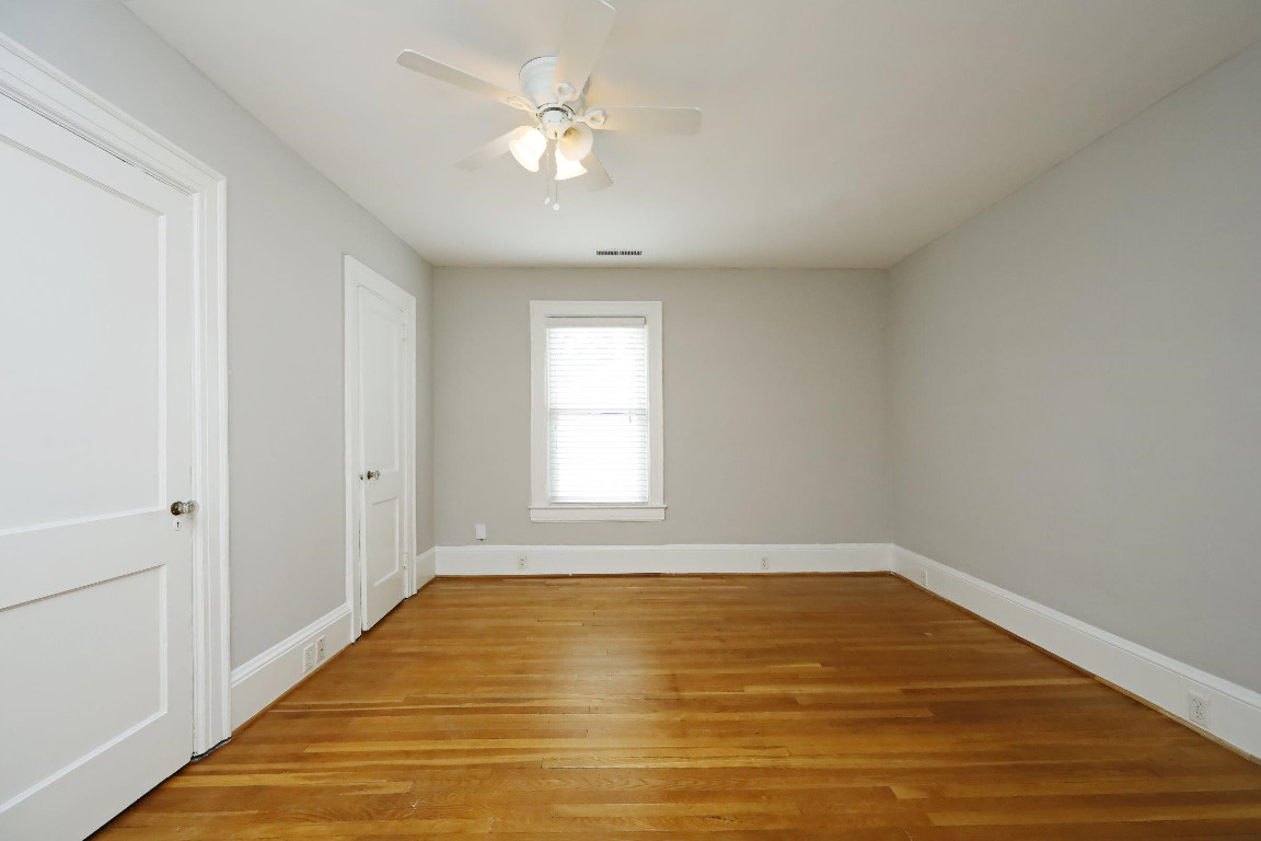 Undisclosed Address Raleigh, NC 27605 - Photo 19 of 38 a view of a room with wooden floor and window