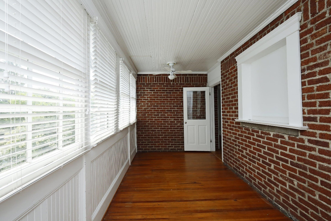 Undisclosed Address Raleigh, NC 27605 - Photo 21 of 38 a view of a balcony with wooden floor
