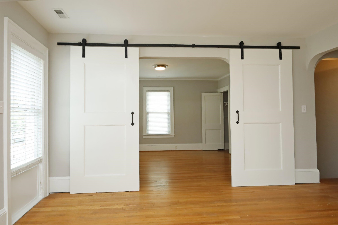 Undisclosed Address Raleigh, NC 27605 - Photo 26 of 38 a view of a room with wooden floor