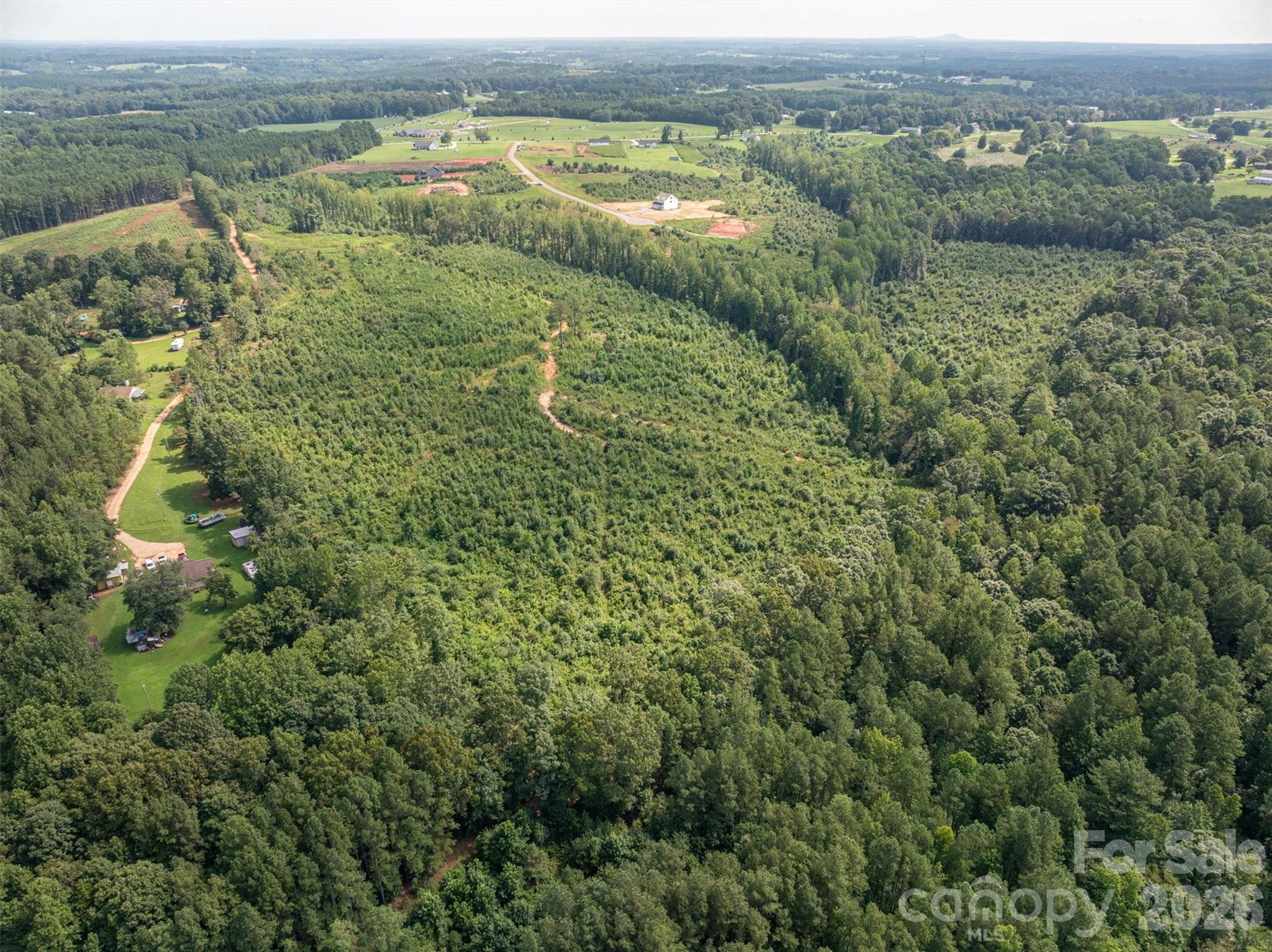 0 Westwinds Road, Unit F3 Lincolnton, NC 28092 - Photo 11 of 14 an aerial view of mountains with green space and fog