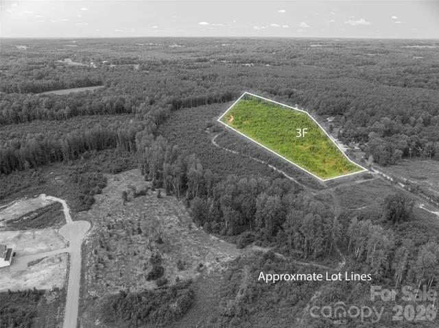 a view of a field with an outdoor space