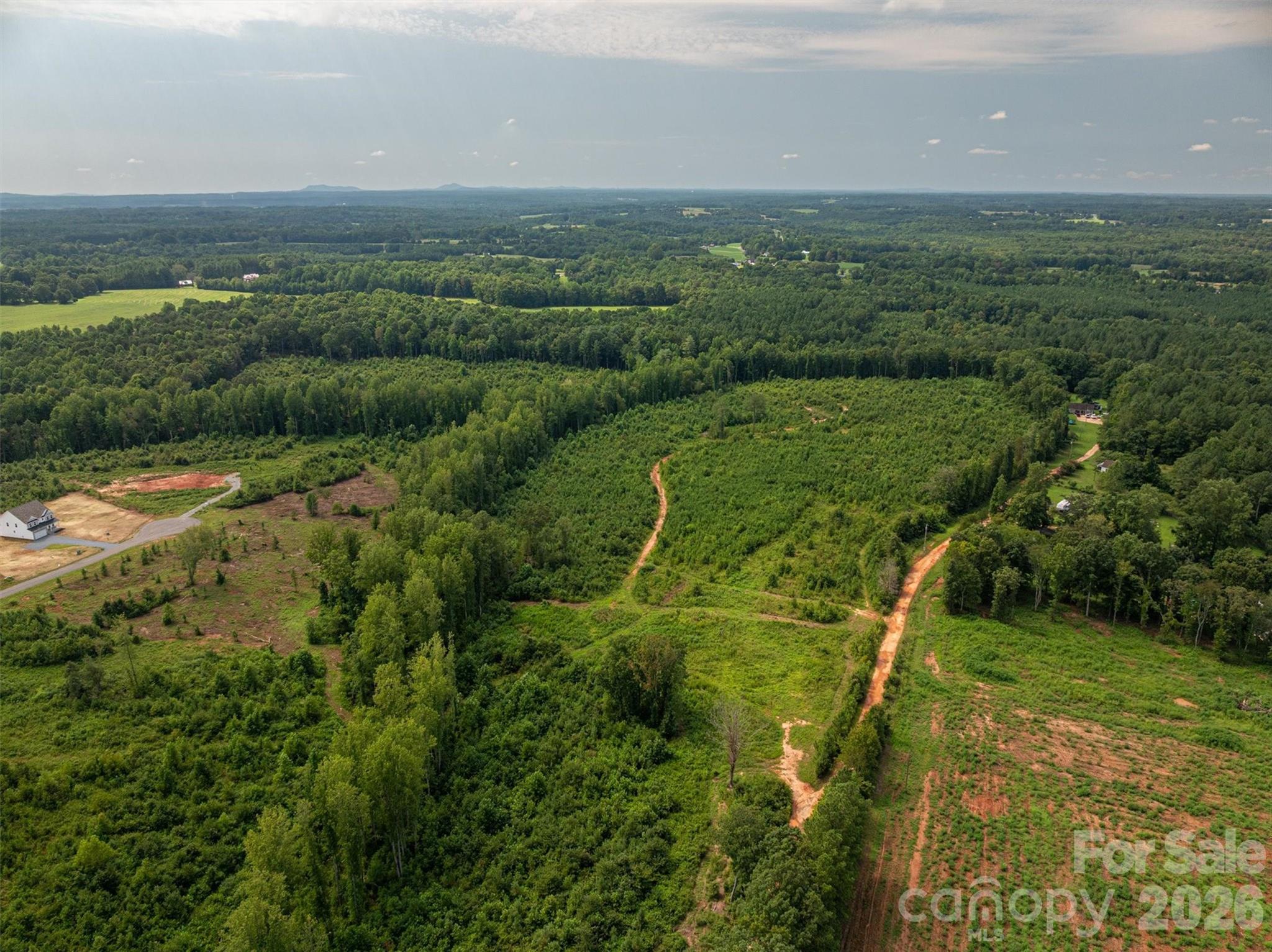 0 Westwinds Road, Unit F3 Lincolnton, NC 28092 - Photo 6 of 14 a view of a city with lush green forest