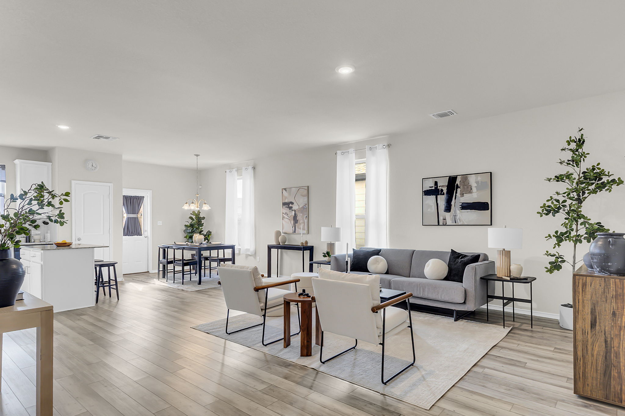 Spacious living room on main floor. Open concept - flows into kitchen and dining room