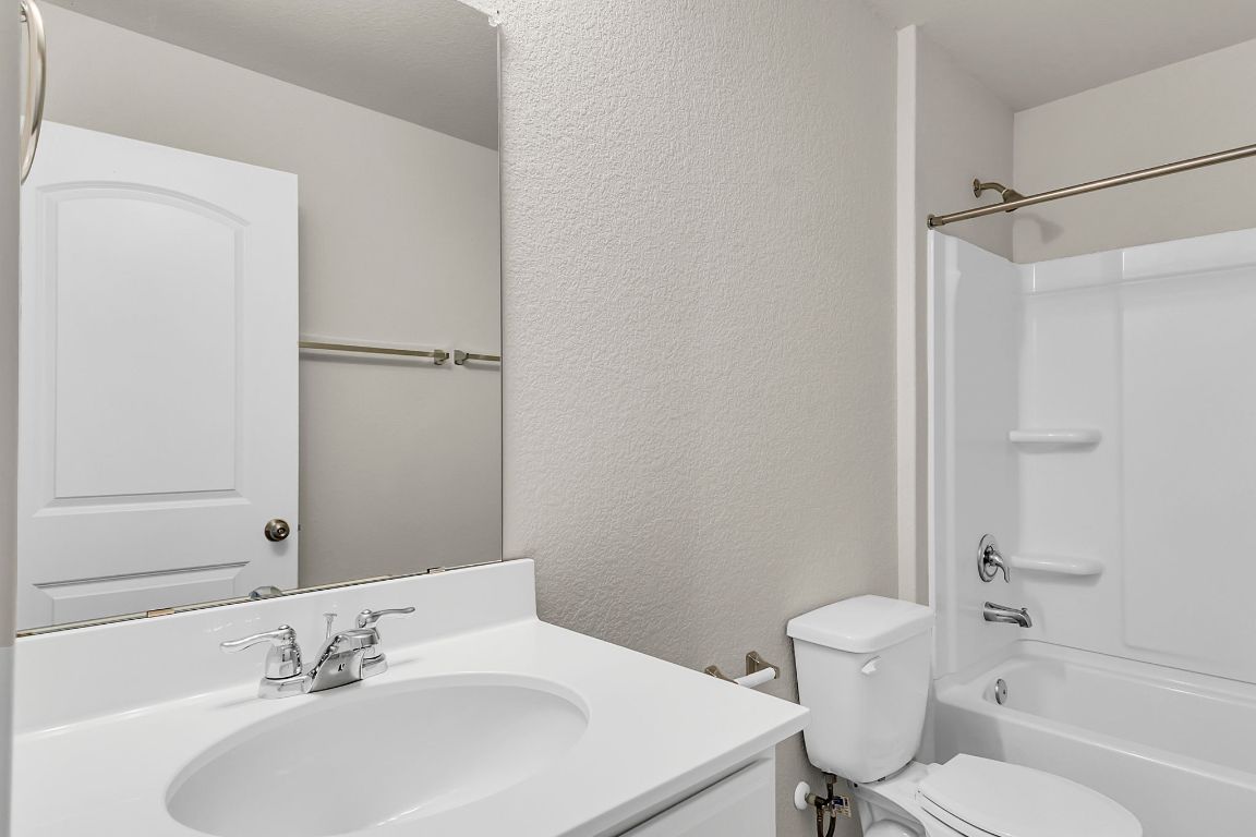 112 Black Alder Street Georgetown, TX 78626 - Photo 22 of 37 a bathroom with a sink toilet and shower