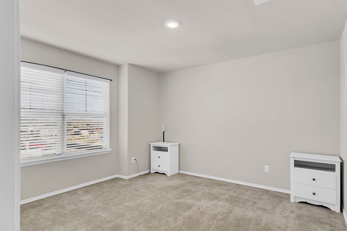 112 Black Alder Street Georgetown, TX 78626 - Photo 24 of 37 a view of an empty room with a window