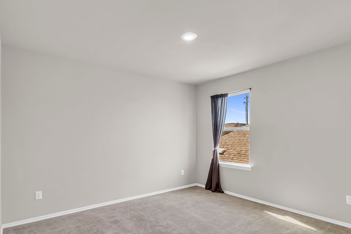 112 Black Alder Street Georgetown, TX 78626 - Photo 25 of 37 an empty room with windows