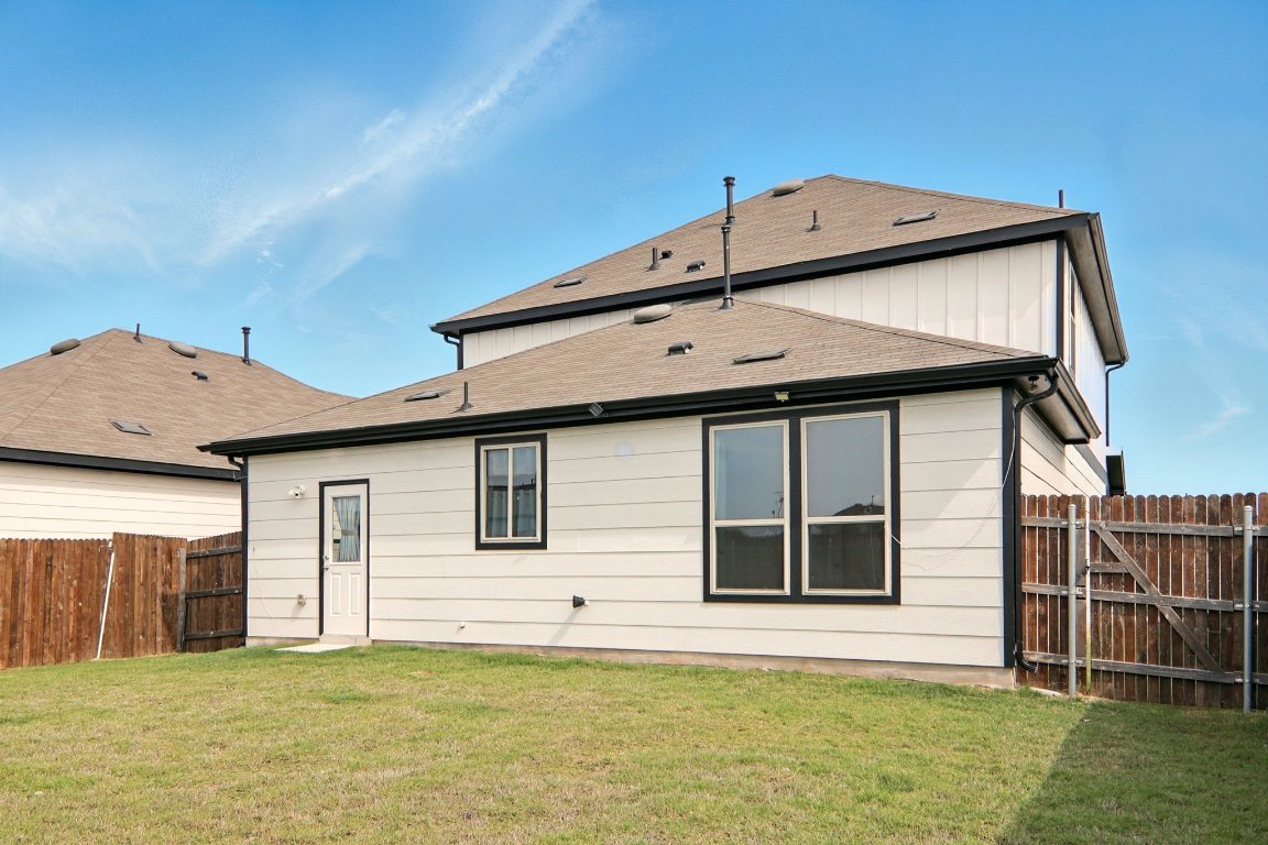 112 Black Alder Street Georgetown, TX 78626 - Photo 30 of 37 a front view of a house with a yard
