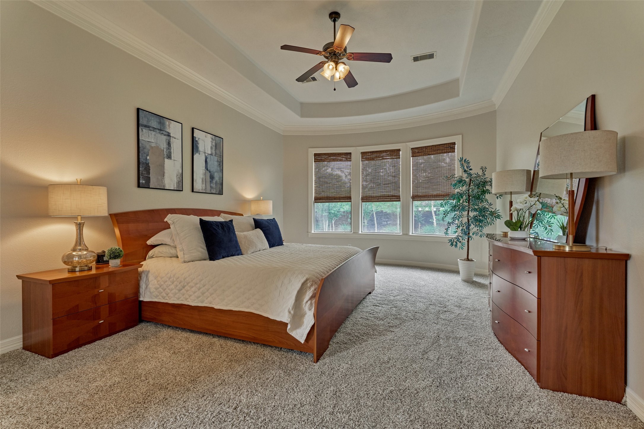 67 South Sage Sparrow Circle Spring, TX 77389 - Photo 16 of 49 a bedroom with bed and a large window