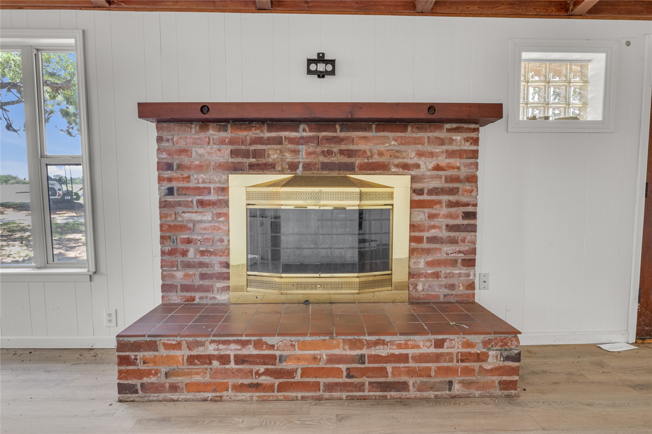 451 Pleasant Grove Road Elgin, TX 78621 - Photo 12 of 32 a view of fireplace with stairs