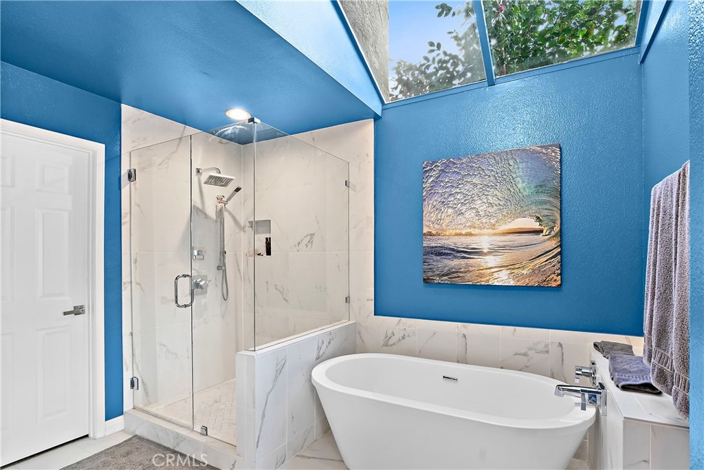 75 Palm Beach Court Dana Point, CA 92629 - Photo 17 of 46 a bathroom with a tub and shower