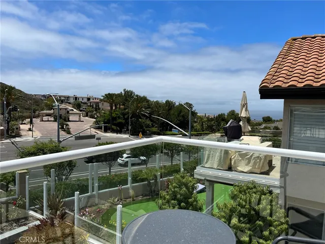 a view of a chairs and table on the terrace