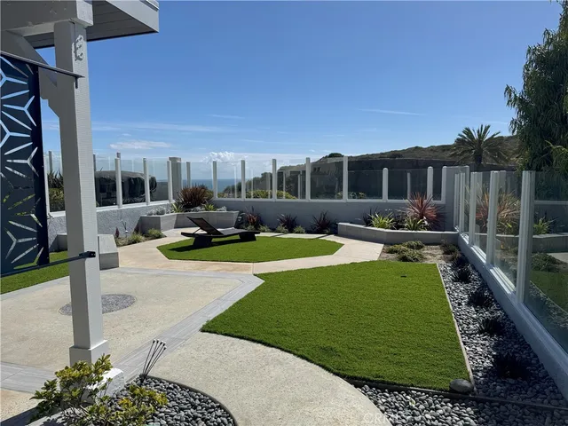 a view of a building with a yard