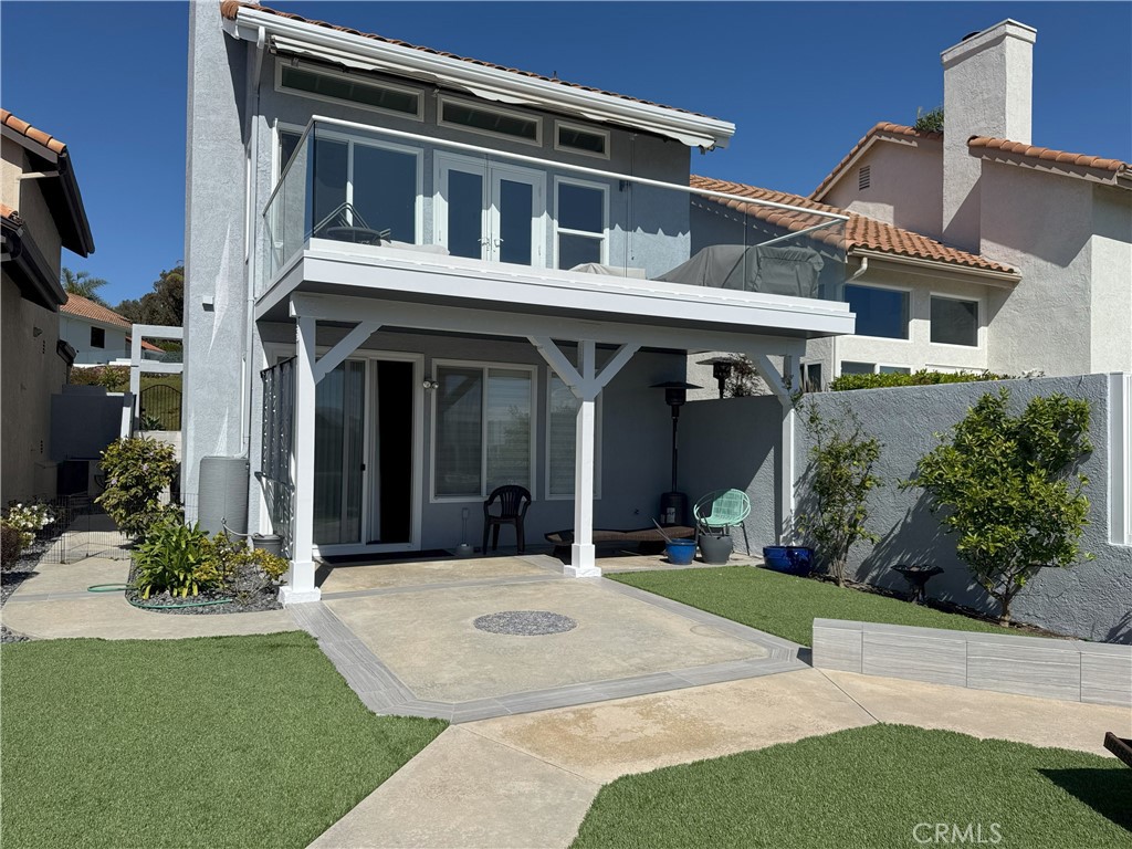 75 Palm Beach Court Dana Point, CA 92629 - Photo 29 of 46 a view of a building with a yard