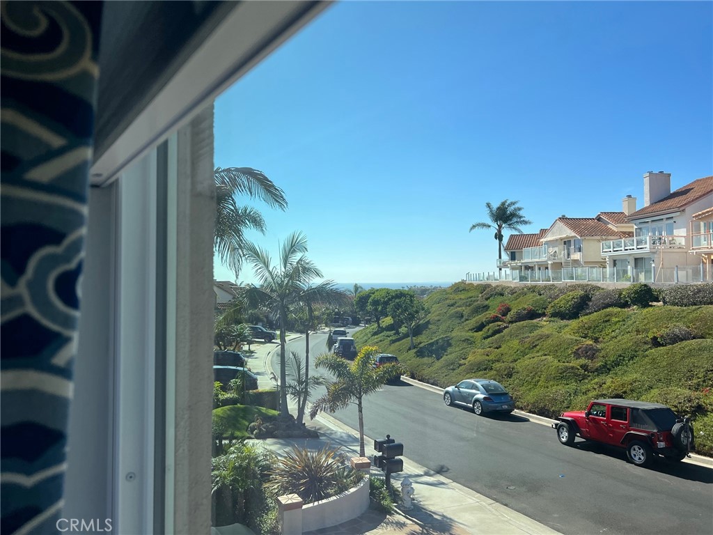 75 Palm Beach Court Dana Point, CA 92629 - Photo 30 of 46 a view of a city street with cars
