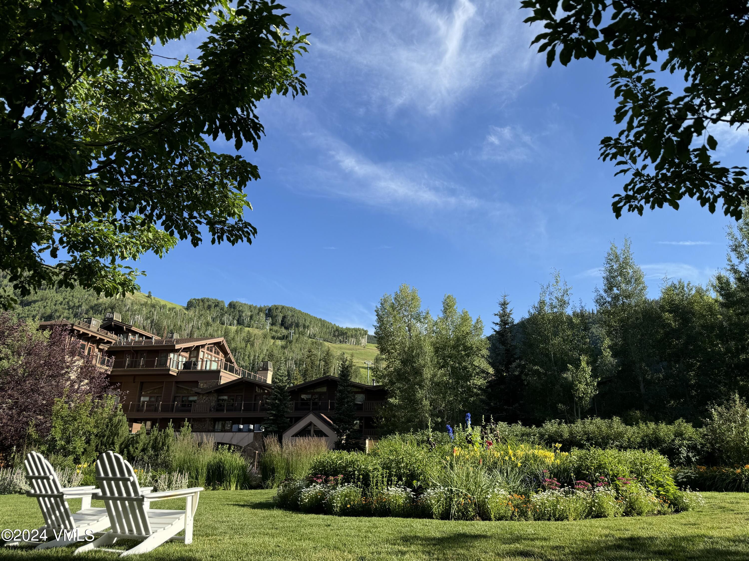 595 Vail Valley Drive, Unit E121 Vail, CO 81657 - Photo 11 of 12 a view of a garden