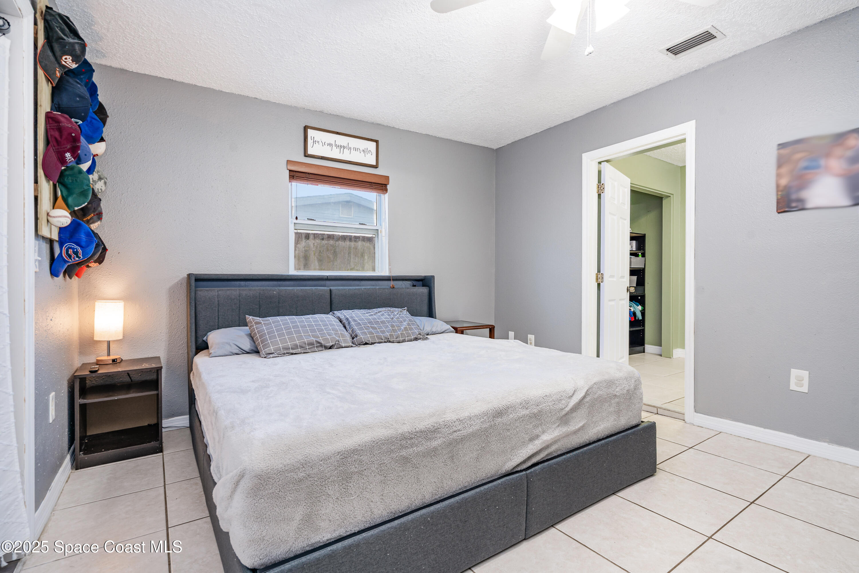 4120 Duke Street Melbourne, FL 32901 - Photo 13 of 29 a bedroom with a bed and a window
