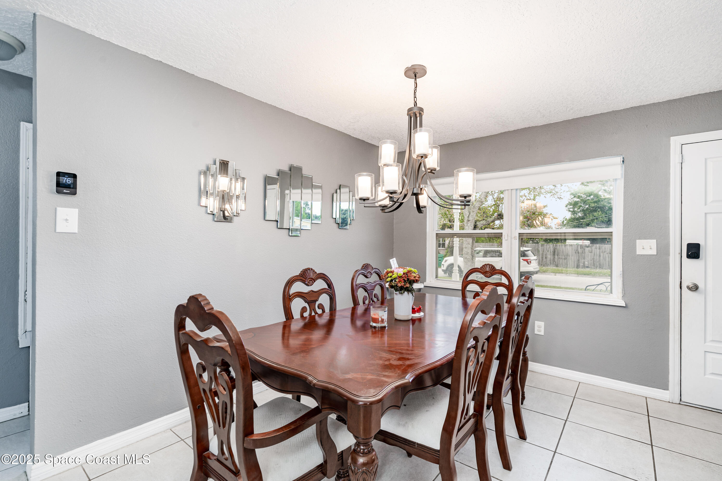 4120 Duke Street Melbourne, FL 32901 - Photo 5 of 29 a view of a dining room with furniture window and outside view