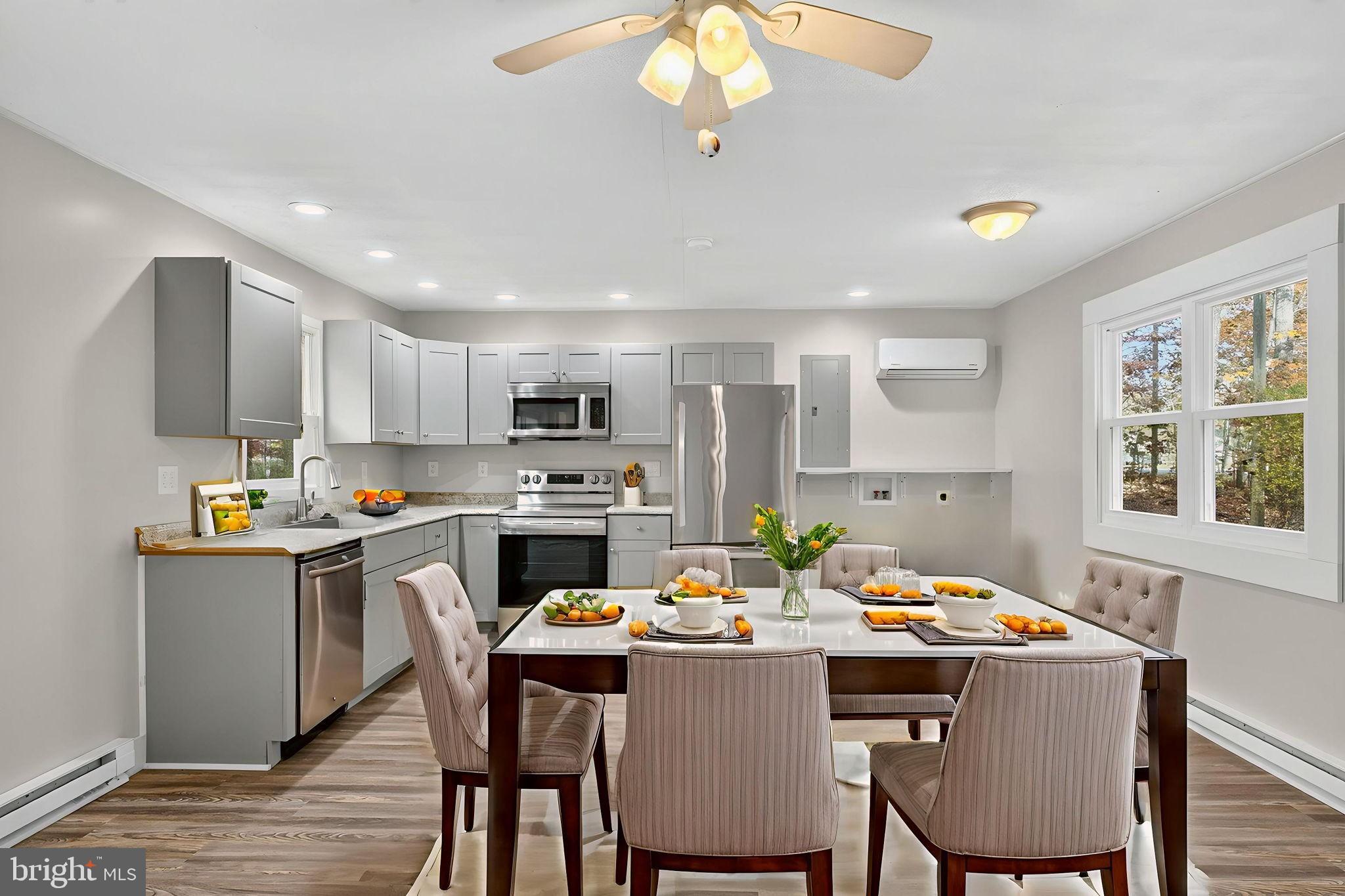19239 Mountain Track Road Orange, VA 22960 - Photo 5 of 19 a kitchen that has a table and chairs in it