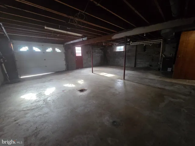 a bathroom with a toilet and a sink