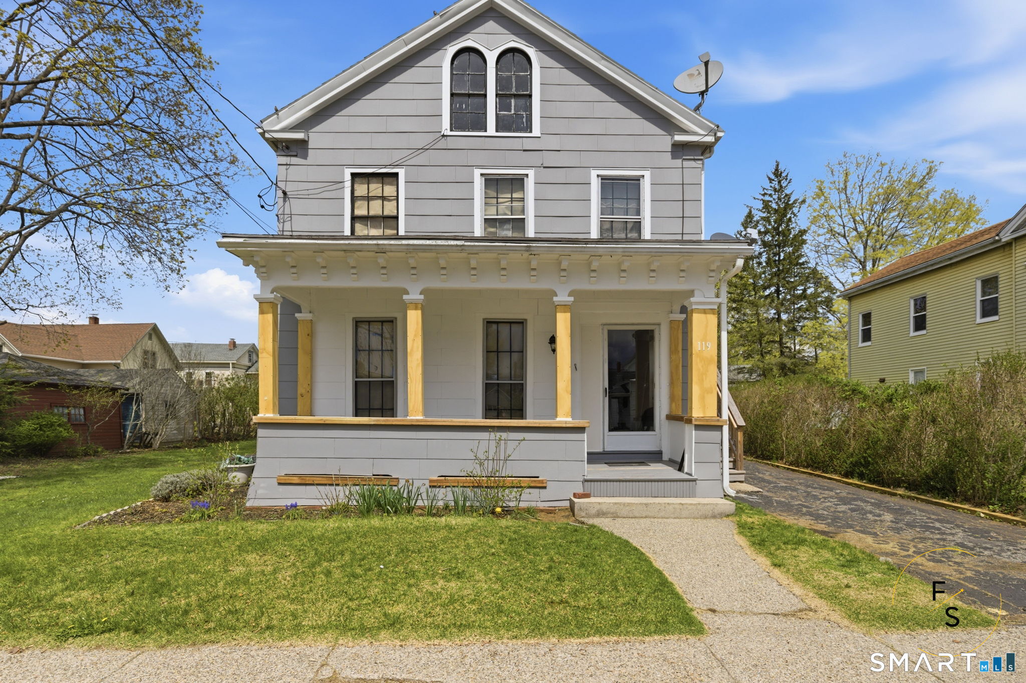 119 Williams Street Norwich, CT 06360 - Photo 1 of 40 a front view of a house with a yard
