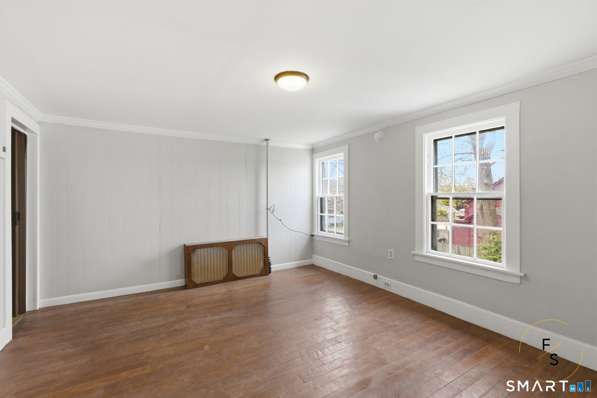 119 Williams Street Norwich, CT 06360 - Photo 20 of 40 an empty room with windows