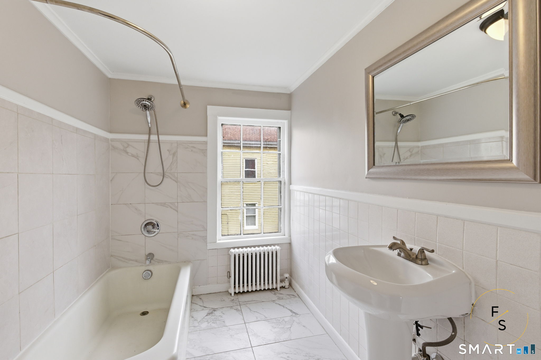 119 Williams Street Norwich, CT 06360 - Photo 28 of 40 a bathroom with a sink a toilet and shower