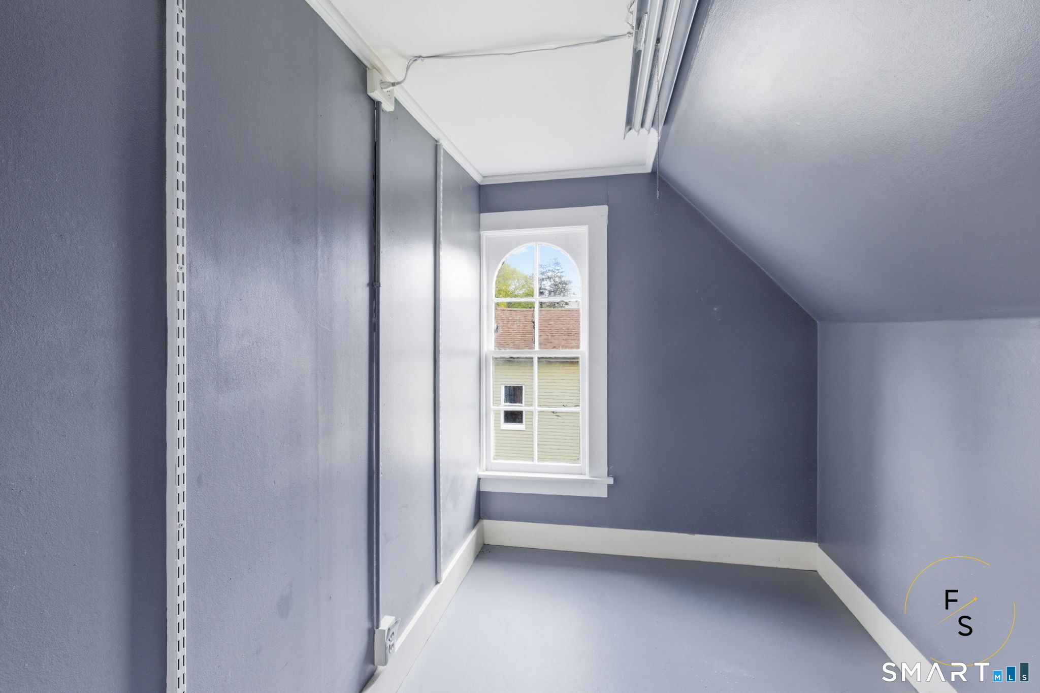 119 Williams Street Norwich, CT 06360 - Photo 29 of 40 a view of an empty room with a window