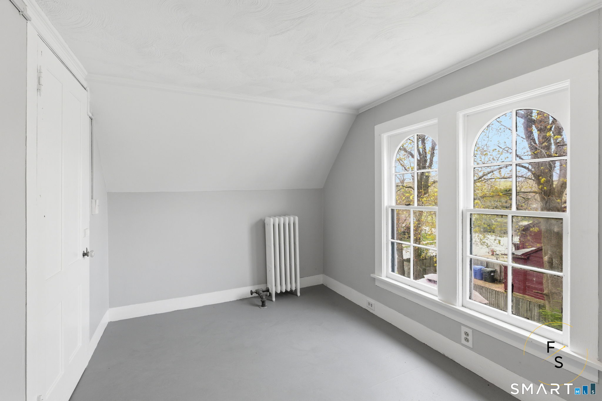 119 Williams Street Norwich, CT 06360 - Photo 31 of 40 an empty room with windows