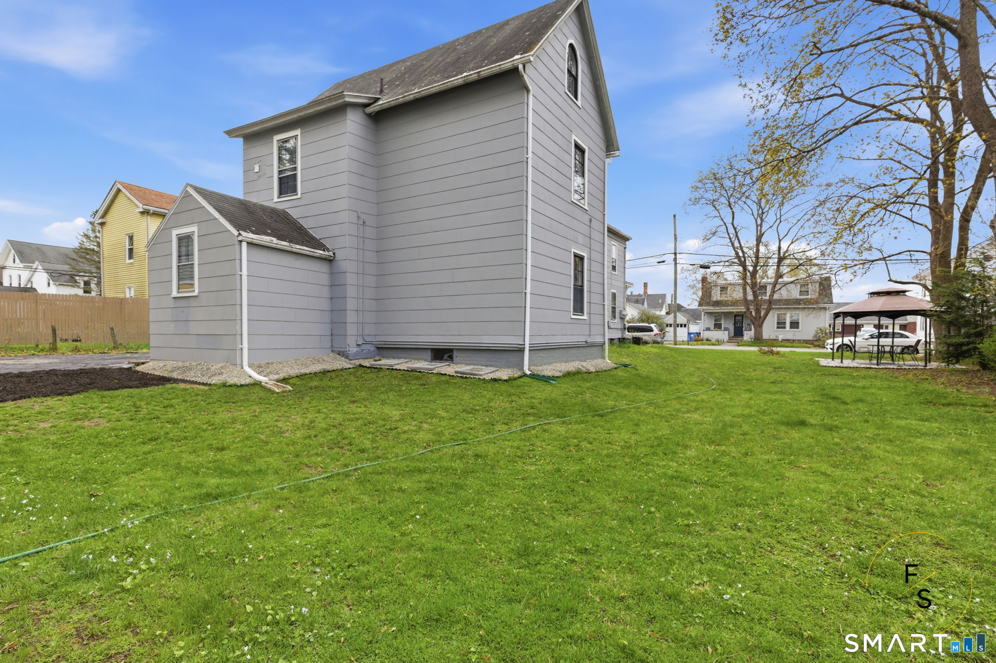 119 Williams Street Norwich, CT 06360 - Photo 38 of 40 a view of a house with a yard