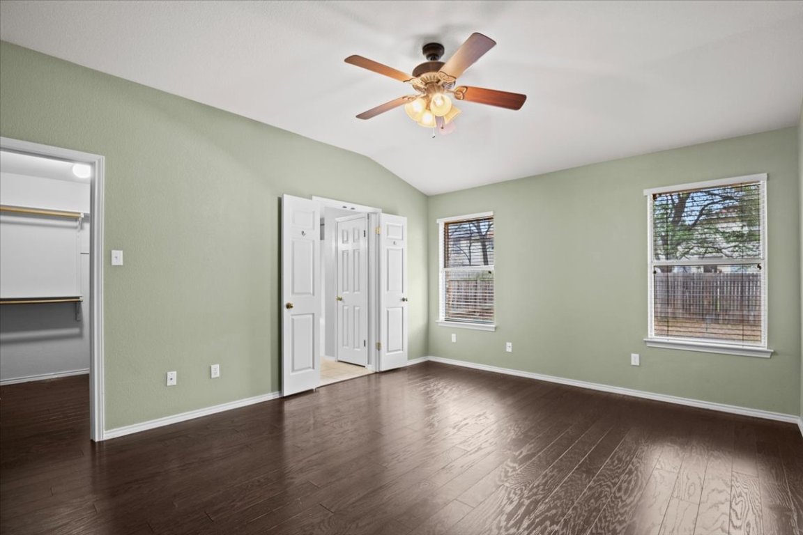 13438 Moscow Trail Austin, TX 78729 - Photo 21 of 40 wooden floor in an empty room with a window