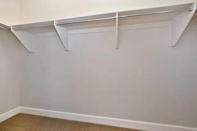 a view of small space with racks on the wall