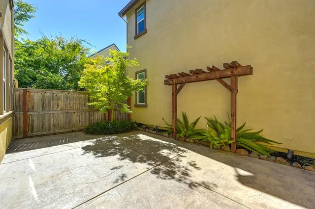 a view of a backyard of a house