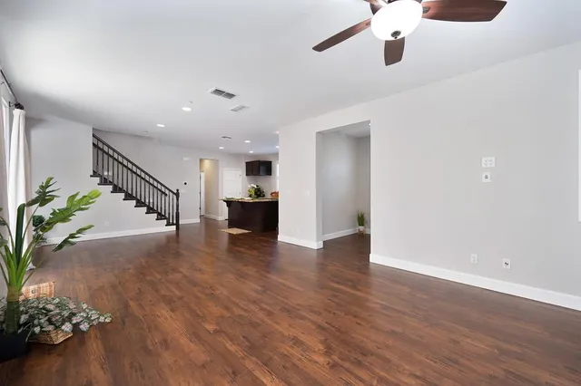 a view of kitchen with furniture and a potted plant