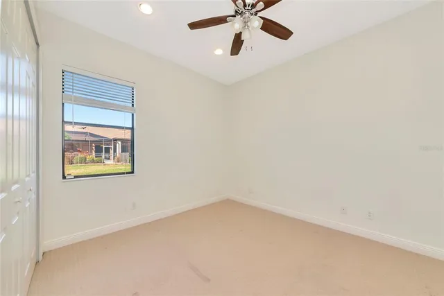 a white bath tub sitting next to a white toilet