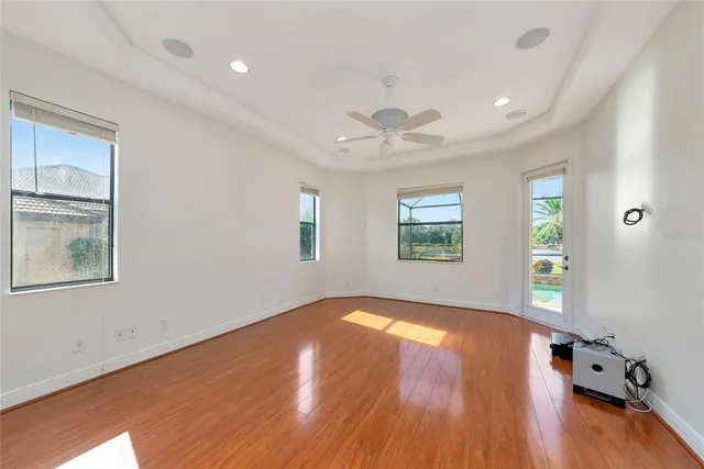 a view of room with window and chandelier