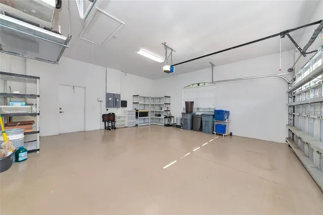 a view of a house with backyard porch and sitting area