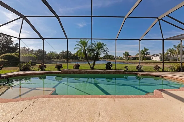 a view of a lake with boats in a house