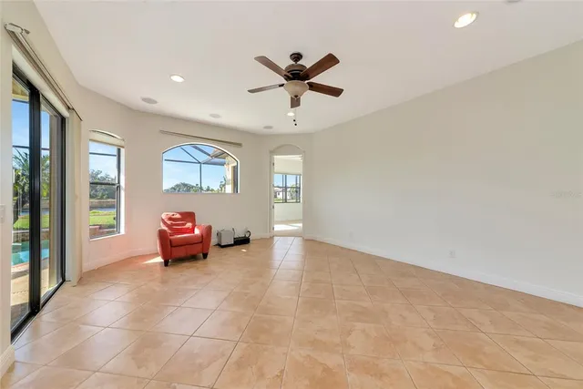a view of kitchen with sink refrigerator and microwave