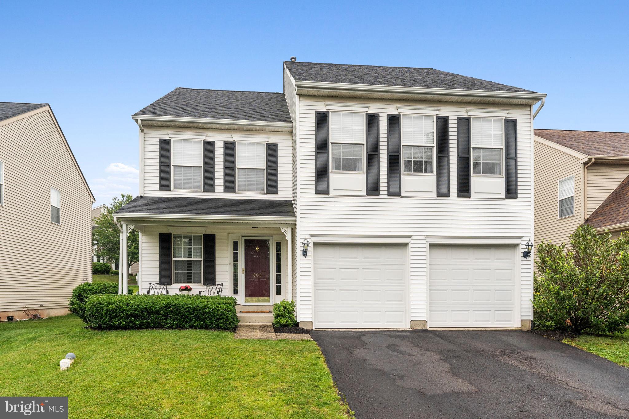 803 Red Coat Road Collegeville, PA 19426 - Photo 1 of 33 a front view of a house with garden
