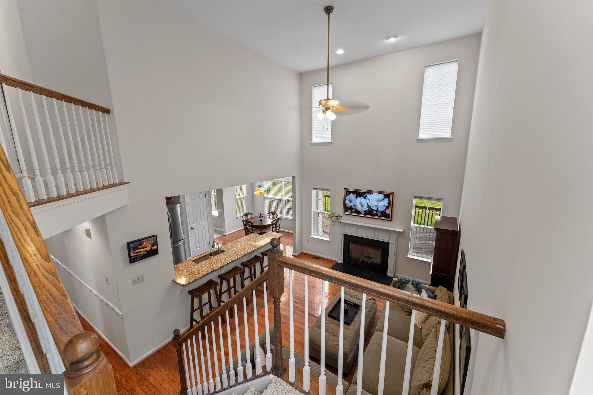 803 Red Coat Road Collegeville, PA 19426 - Photo 11 of 33 a view of a livingroom with furniture hardwood floor and fireplace