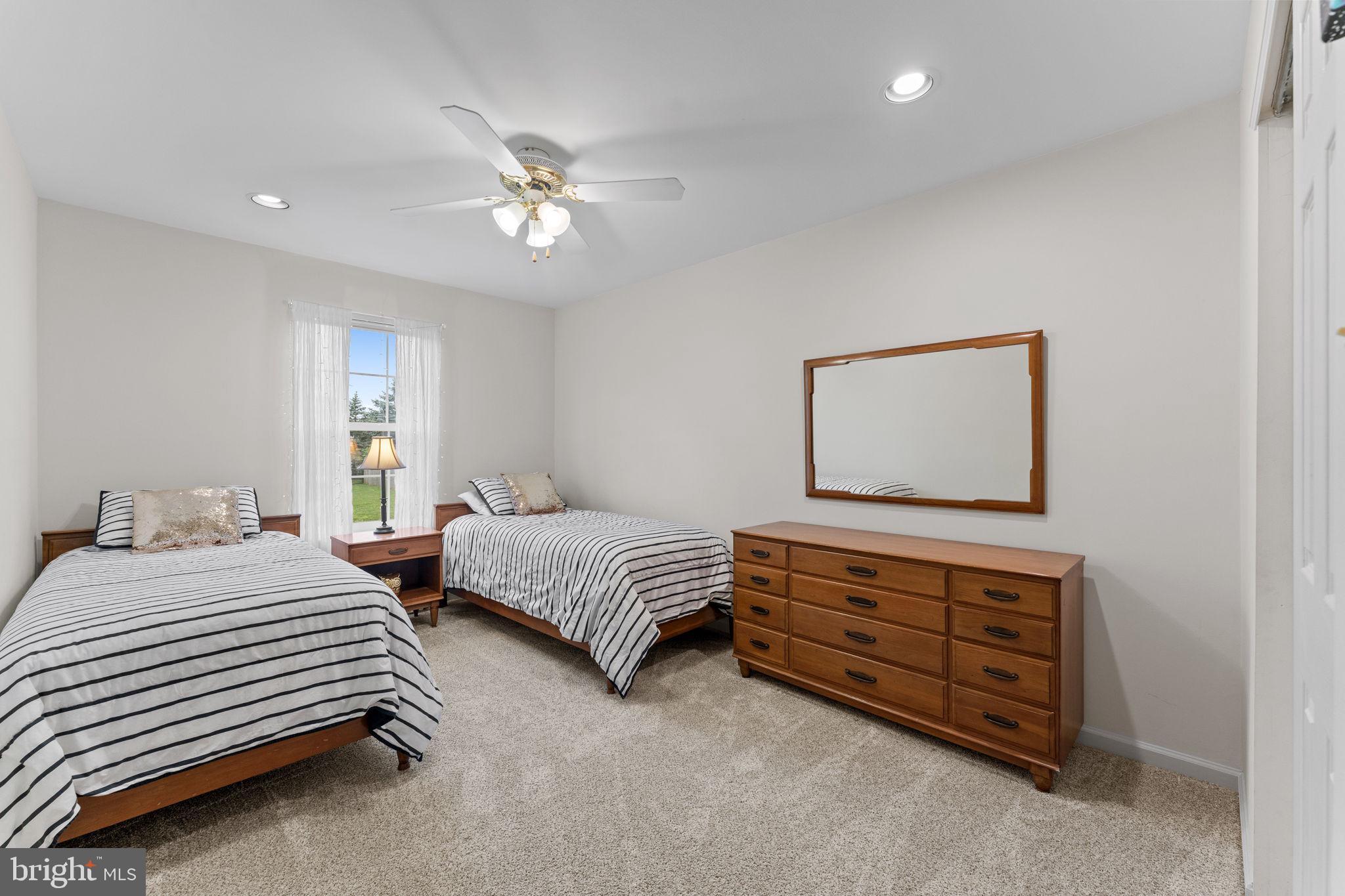 803 Red Coat Road Collegeville, PA 19426 - Photo 23 of 33 a bedroom with bed and window