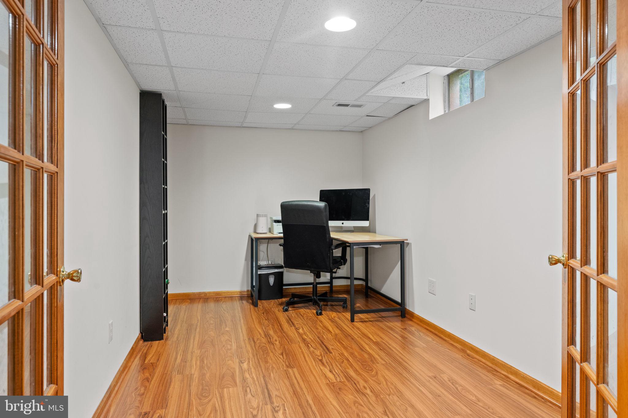 803 Red Coat Road Collegeville, PA 19426 - Photo 28 of 33 a view of a workspace with furniture and wooden floor