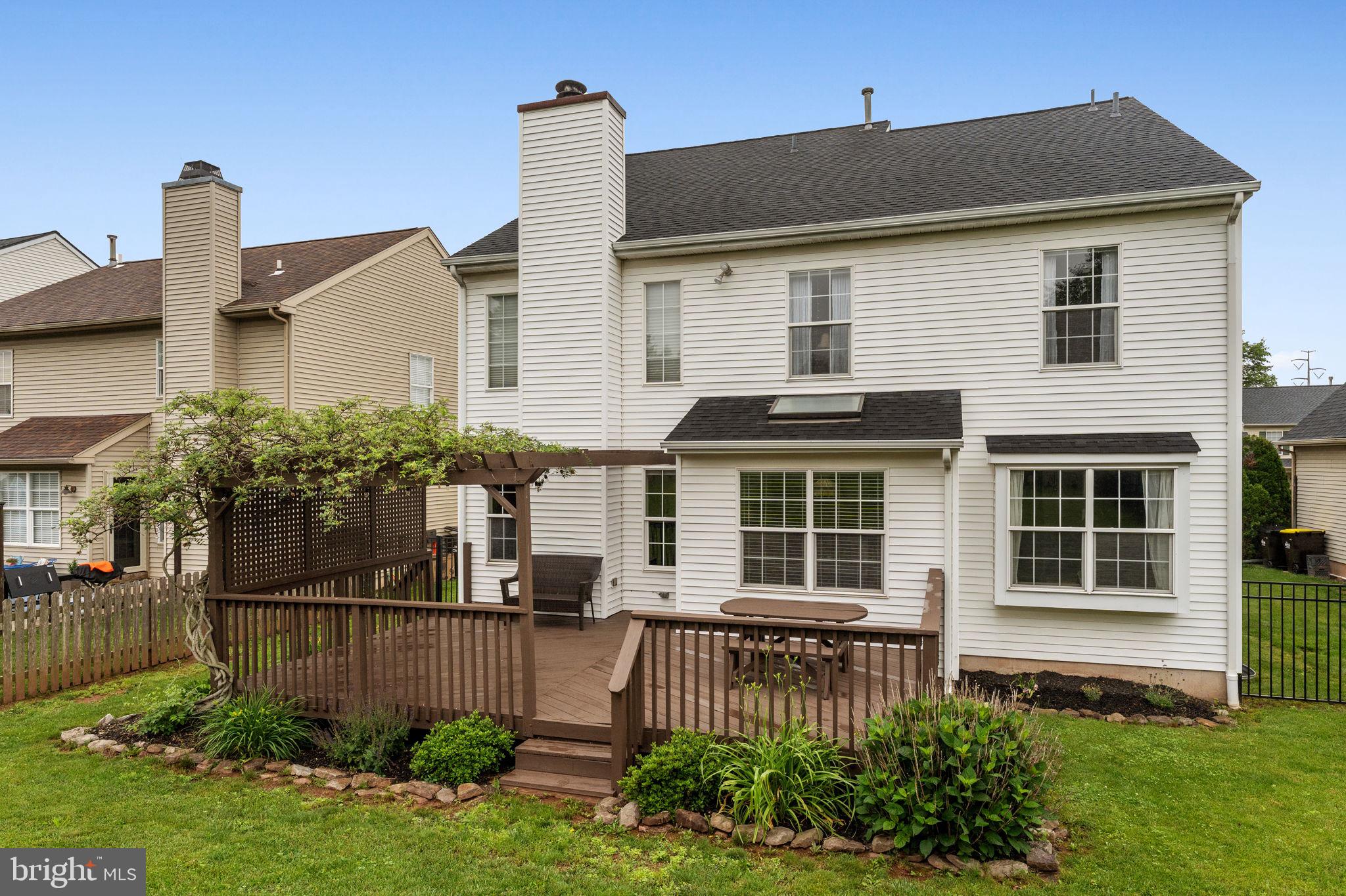 803 Red Coat Road Collegeville, PA 19426 - Photo 30 of 33 a front view of a house with a garden