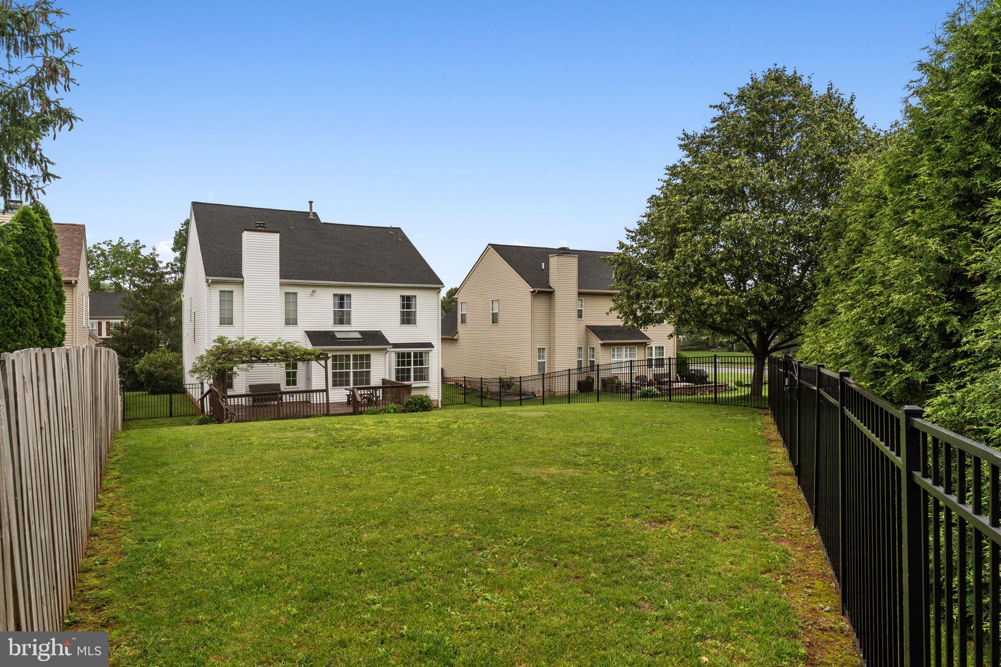 803 Red Coat Road Collegeville, PA 19426 - Photo 33 of 33 a view of a house with backyard and porch