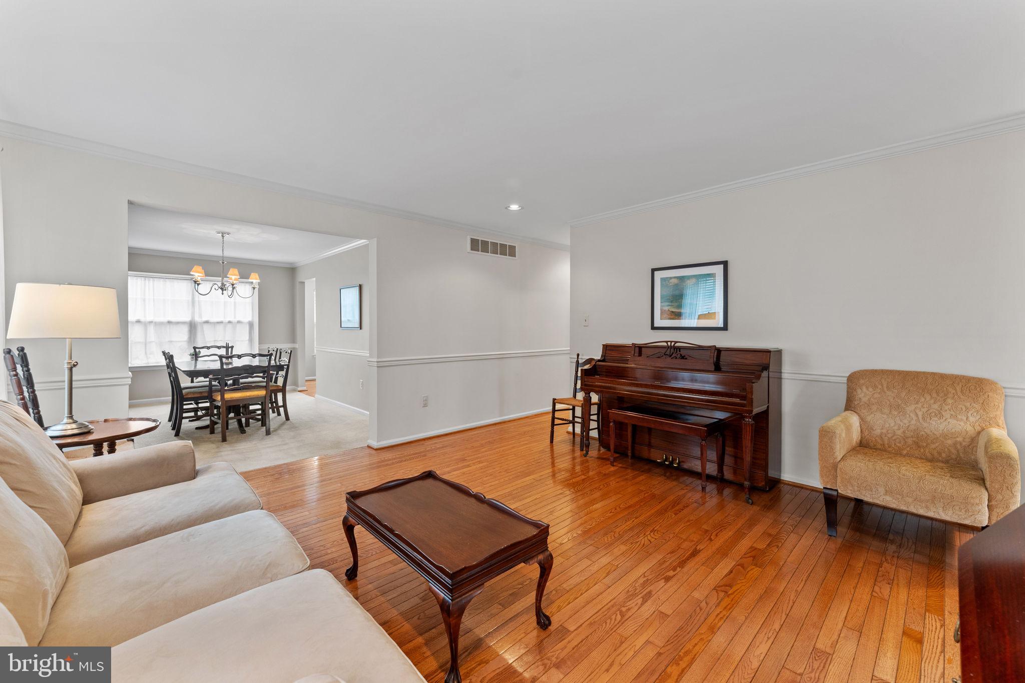 803 Red Coat Road Collegeville, PA 19426 - Photo 6 of 33 a living room with furniture and a wooden floor