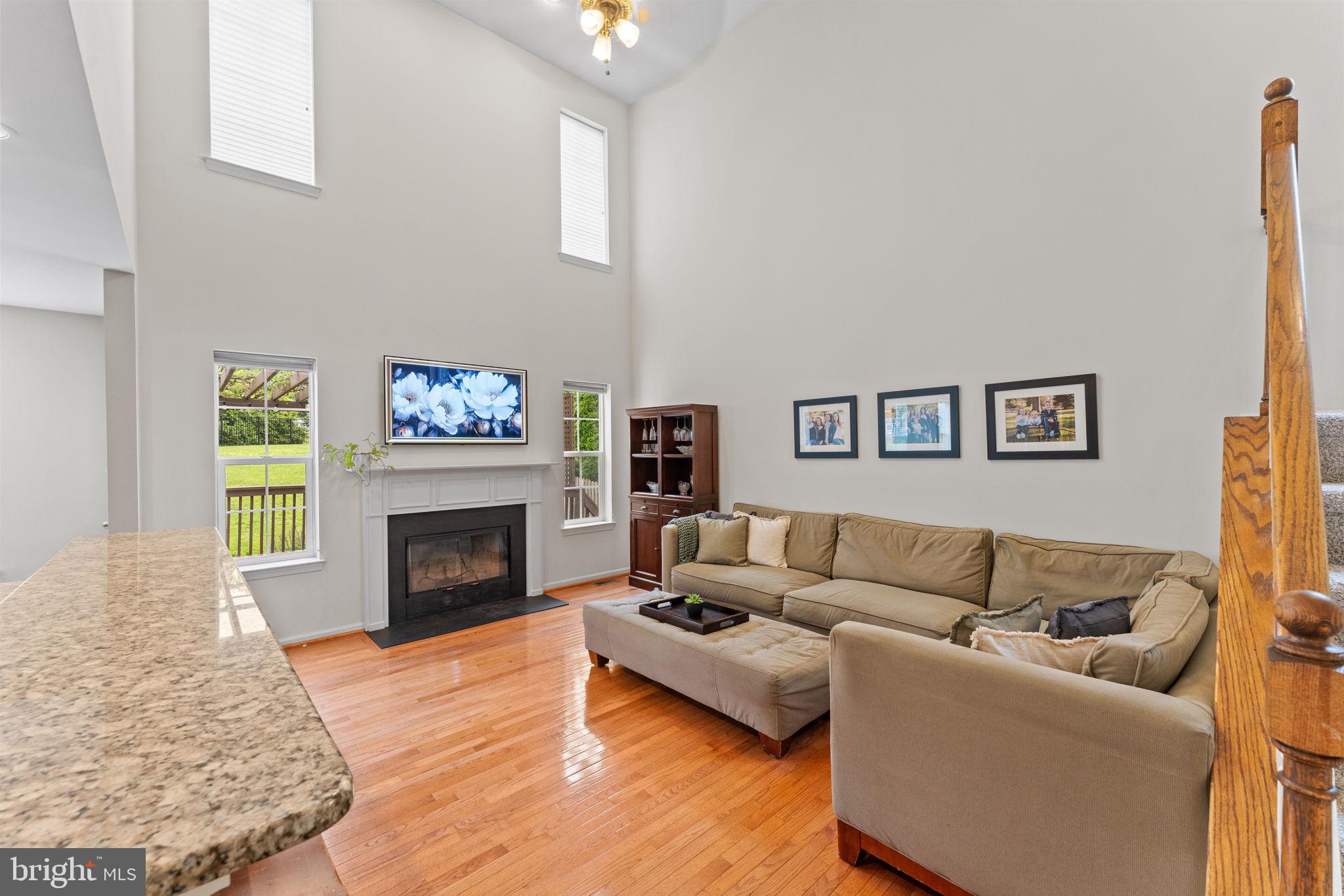 803 Red Coat Road Collegeville, PA 19426 - Photo 9 of 33 a living room with furniture and a fireplace