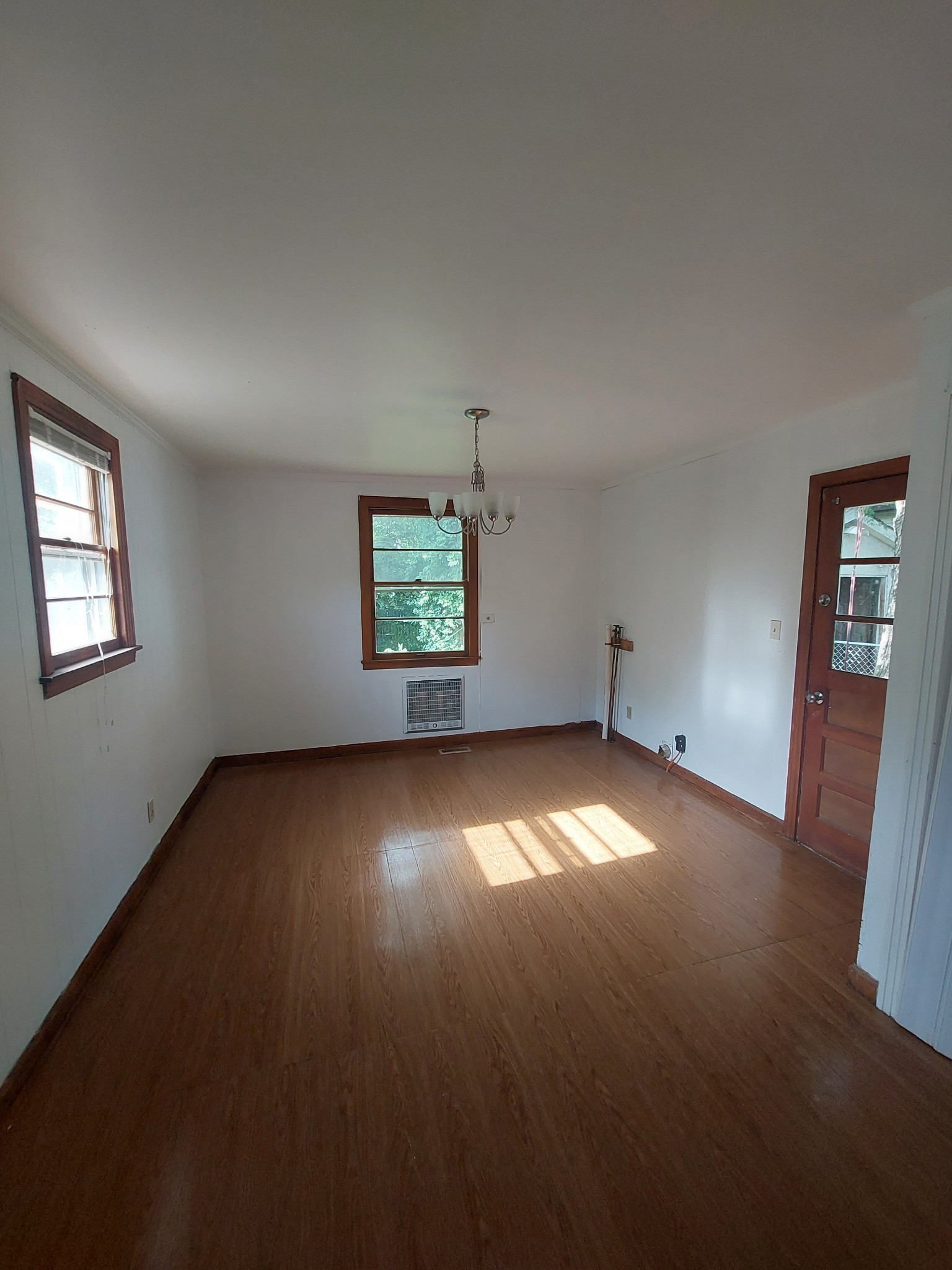 123 McKinley Street Madison, TN 37115 - Photo 7 of 11 wooden floor and windows in an empty room