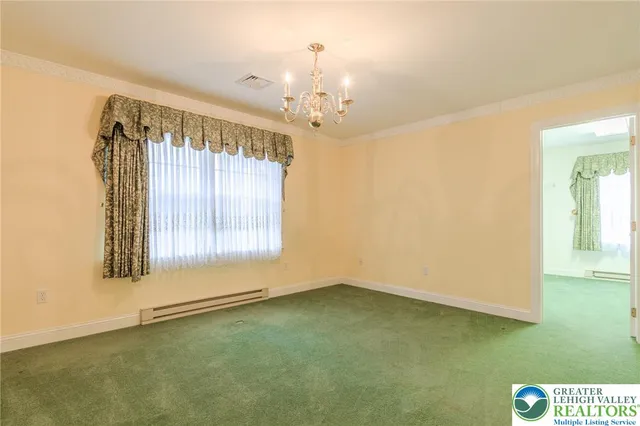 an empty room that has a window